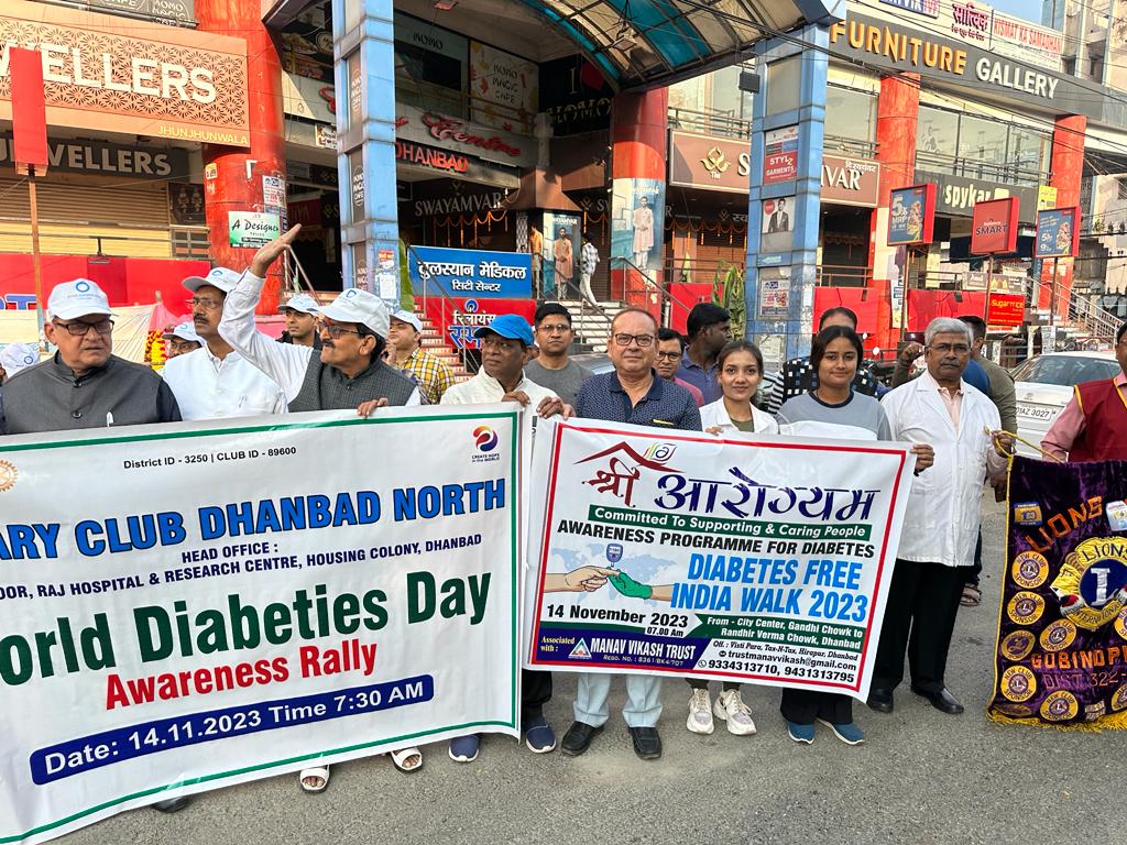 A photograph capturing a moment of community service and trust engagement.